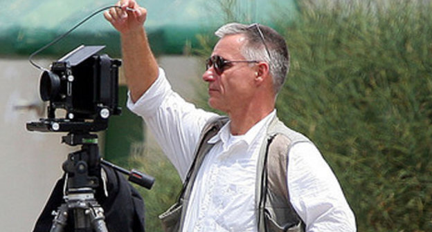 Фотограф за работой. Фото: Martin Stupich, http://www.flickr.com/photos/openthreads/184302519/