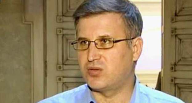 Политолог Андрей Епифанцев. Кадр из видеорепортажа телеканала РБК-ТВ от 26 августа 2011 г.