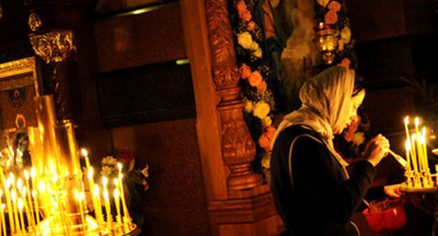 В православном храме. Фото: Сергей Карпов / Югополис