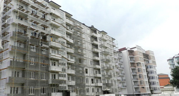 Строительство многоэтажного дома в Махачкале. Фото http://www.riadagestan.ru Строительство многоэтажного дома в Махачкале. Фото http://www.riadagestan.ru