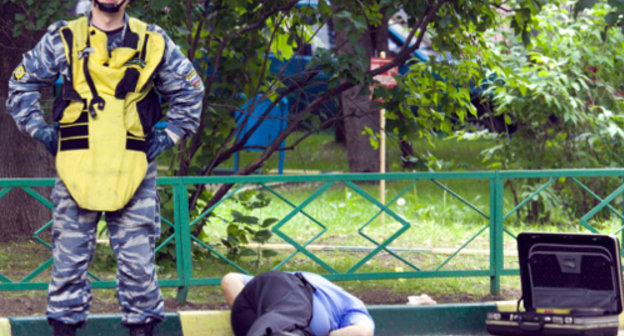На месте убийства Юрия Буданова. Москва, 10 июня 2011 г. Фото Юрия Тимофеева, RFE/RL