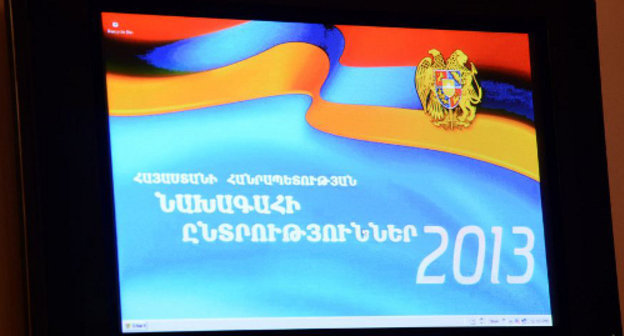 Логотип президентских выборов-2013 на мониторе в ЦИК Армении. Фото: Photolure Логотип президентских выборов-2013 на мониторе в ЦИК Армении. Фото: Photolure