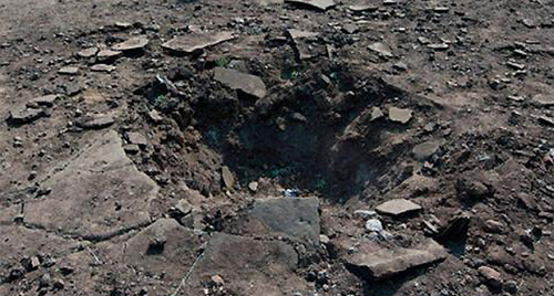 Воронка от снаряда. Фото: http://mignews.com.ua/sobitiya/inworld/3234989.html