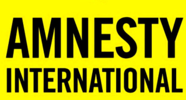 Логотип Amnesty International. Фото: RFE/RL
