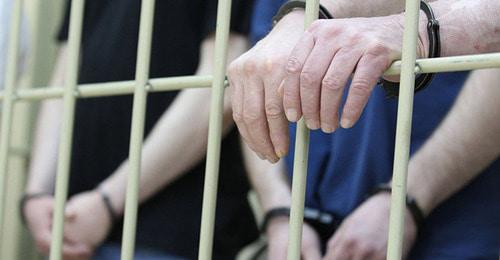 Задержанные за решеткой. Фото © Sputnik/ Евгений Биятов
Задержанные за решеткой. Фото © Sputnik/ Евгений Биятов