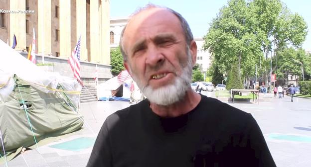 Малхаз Мачаликашвили. скриншот  видео канала "Кавказ.Реалии"
https://www.youtube.com/watch?v=Iv5tQwBZMwc