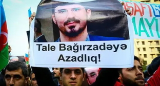 Плакат с портретом Талеха Багирзаде. Фото Азиза Каримова для "Кавказского узла"