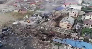На месте взрыва в Махачкале. Фото: https://vmeste-rf.tv/news/tragediya-v-makhachkale-vzryv-unes-zhizni-35-chelovek/