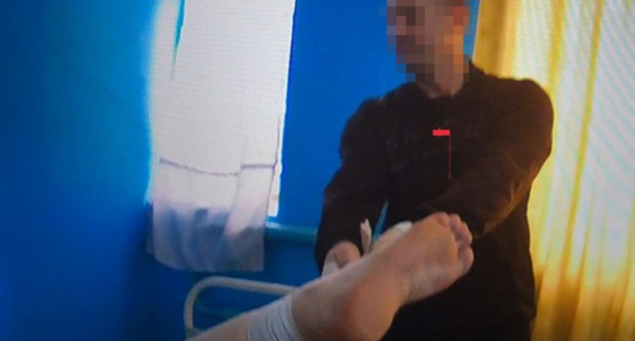 Стоп-кадр видео пыток. Правозащитный проект Gulagu.net